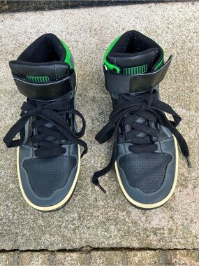 Puma Black Sneakers with Green Logo Accent